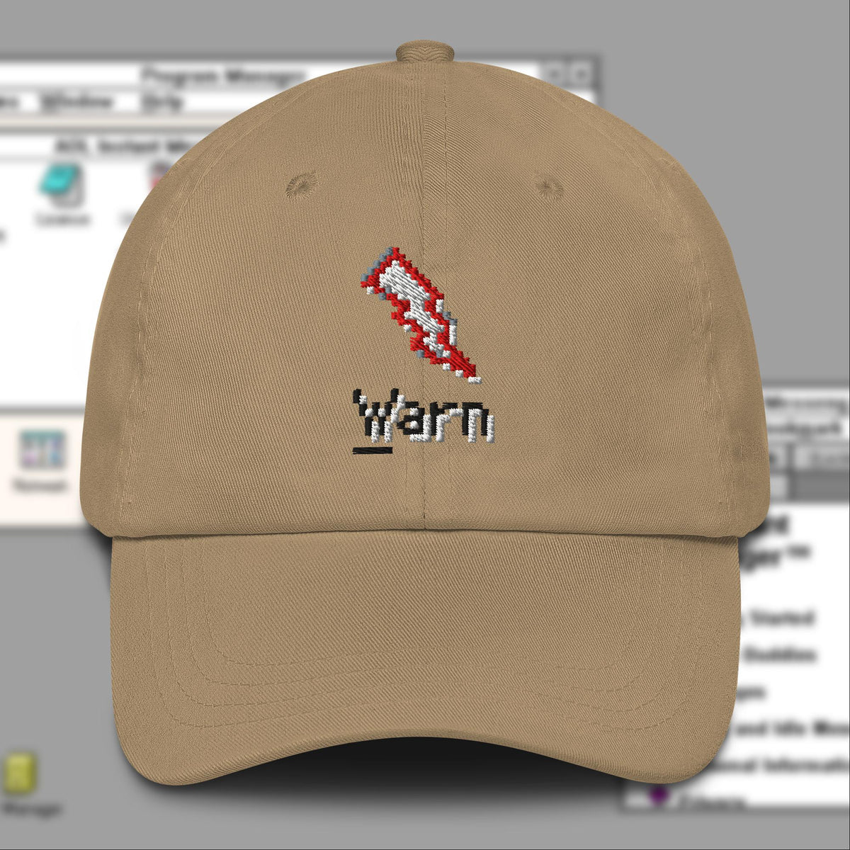 AIM Warn! Hat in khaki with the embroidered AIM Warn button, over a blurred AIM sign-on screen