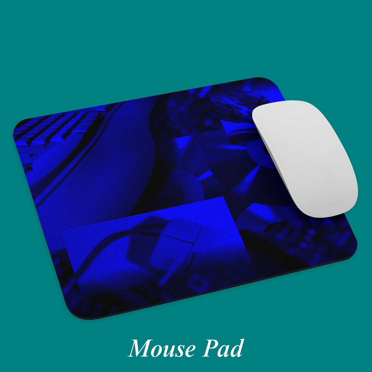 Windows 95 Setup Mouse Pad at an angle with a white mouse on top, showing the blue setup collage